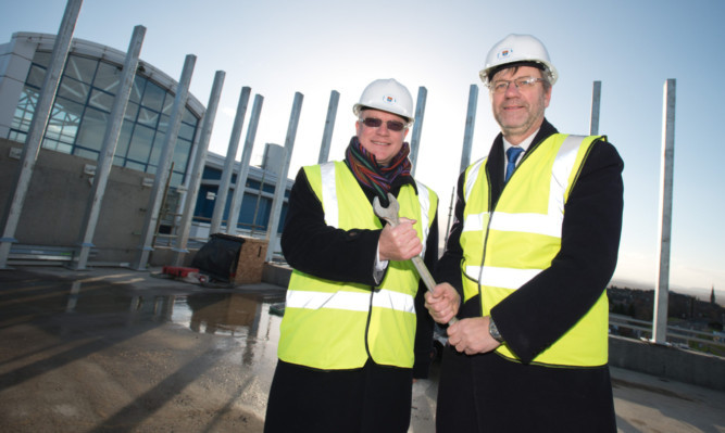 Professor Michael Ferguson (left) and Dundee University principal and vice-chancellor Pete Downes at the topping-out ceremony.
