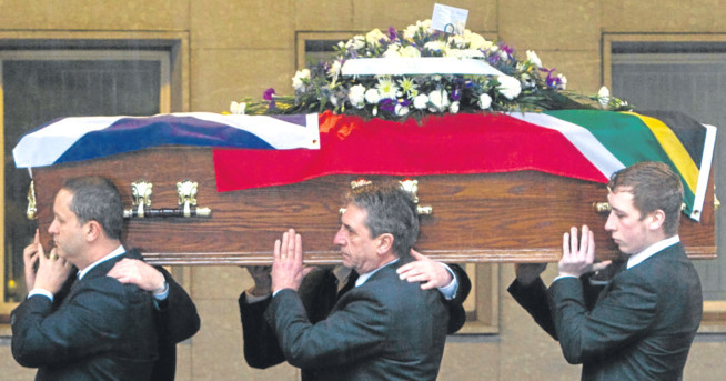 Mourners carry Kenny Whiteside's coffin into Kirkcaldy Crematorium.