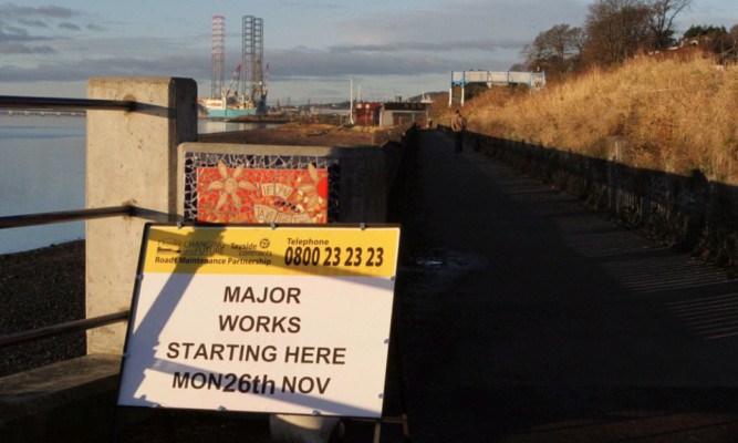 Weeks of work are under way to improve the path between Stannergate and Douglas Terrace.