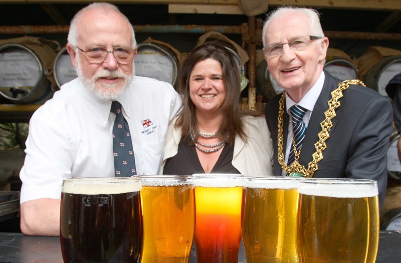 Kris Miller, Courier, 28/05/10, News. Picture today at Fishermans Tavern, Dundee. Pic shows L/R, Captain Joe Samson (RNLI), Tracey Cooper (Fishermans Manager) and LP John Letford. The group were at the Tavern to toast the start of the Beer Festival which runs all this weekend with lots of guest ales, some of which can be seen at front of pic.