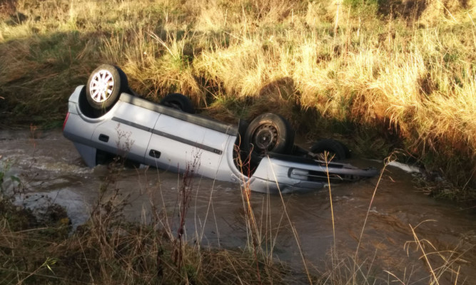 The car came to rest with the front driver and passenger seat area almost completely submerged.