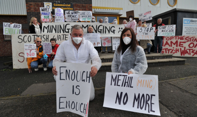 Locals Peter and Carol Meldrum leading a protest demanding action to tackle the Methil Ming last year.
