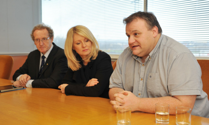 Lindsay Roy MP and Esther McVey Works and Pensions Secretary with Remploy shop steward Colin Cuthbert.