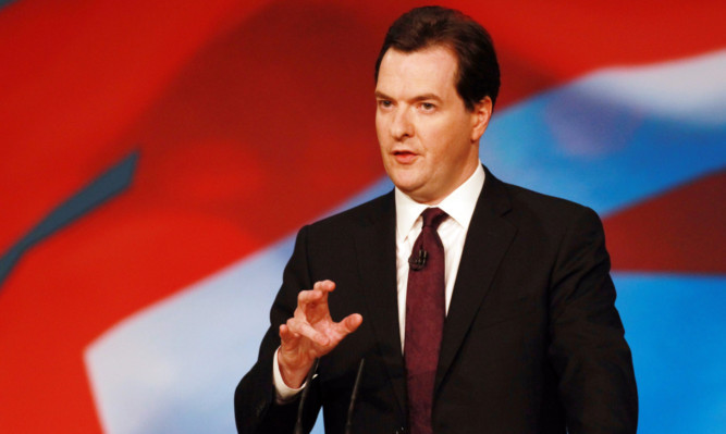 Chancellor George Osborne addresses today's session of the Conservative Conference at Birmingham's International Convention Centre.   PRESS ASSOCIATION Photo. Picture date: Monday October 8, 2012.  Photo credit should read: David Jones/PA Wire