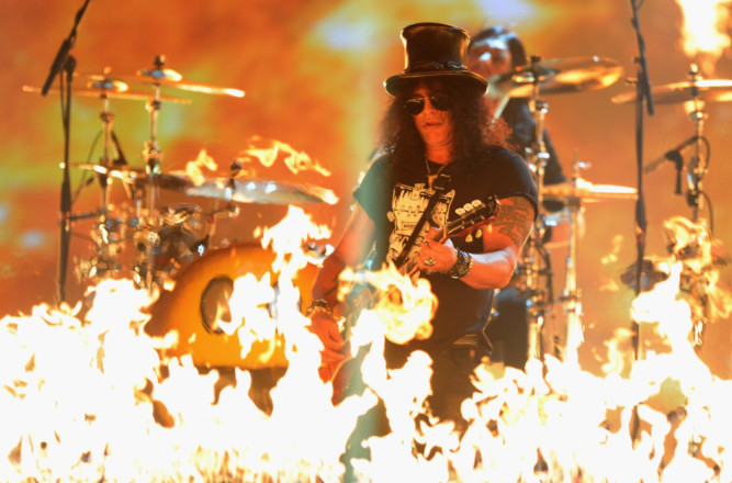 Some of the biggest stars of the music world flocked to Scotland for the MTV music awards at the Glasgow Hydro. Slash performs on stage.
