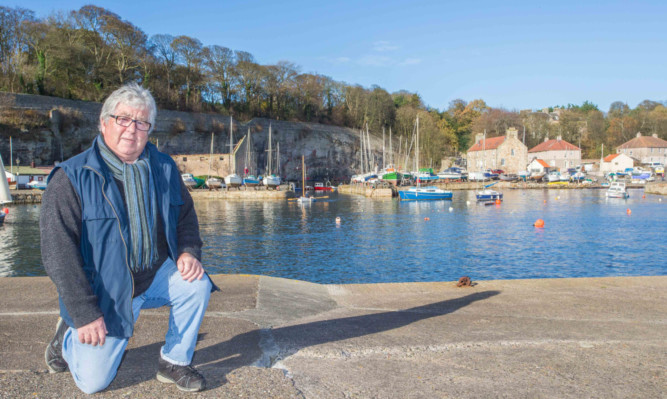 Mr Shields shows the new cracks that have appeared in Dysart Harbour.