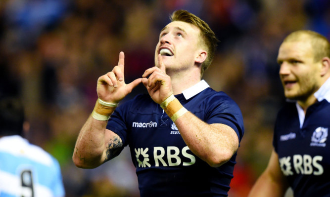 Scotlands Stuart Hogg celebrates a try in the win over Argentina.