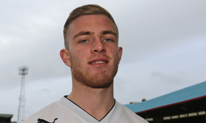 Dundee's new midfielder David Morgan joined up at Dens on loan from Nottingham Forest

.