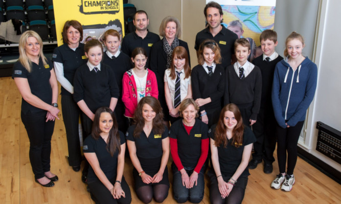Sports Minister Shona Robison with pupils from Perth Grammar School and St Johns Academy and local sports stars, including adventurer Mark Beaumont.