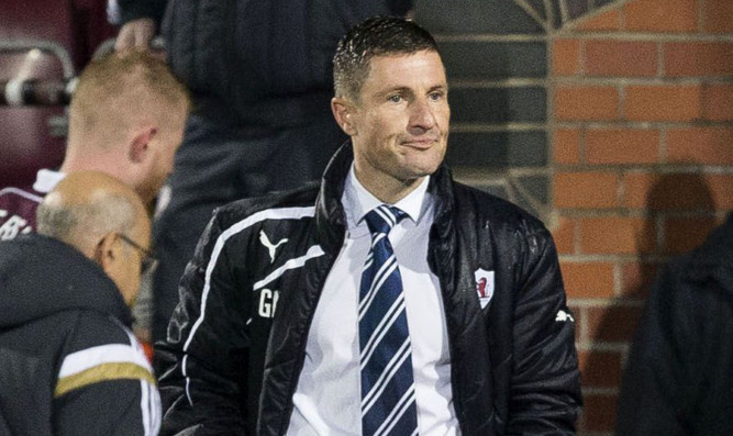 Grant Murray watching his men losing out to Hearts on Saturday.