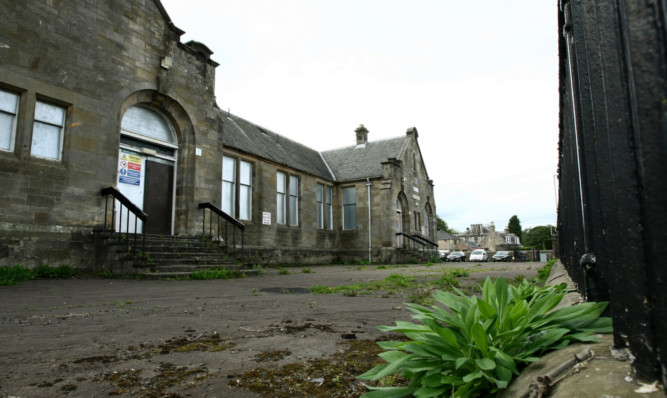 The planned development at the former Kinross High site is causing controversy among officials.