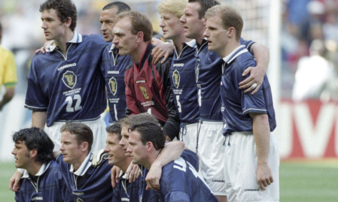Kevin Gallacher (second from left on bottom row) before Scotland played Brazil at France 98.