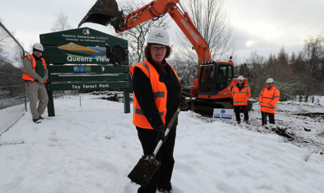 Councillor Kate Howie breaks the ground in the first phase of the refurbishment.