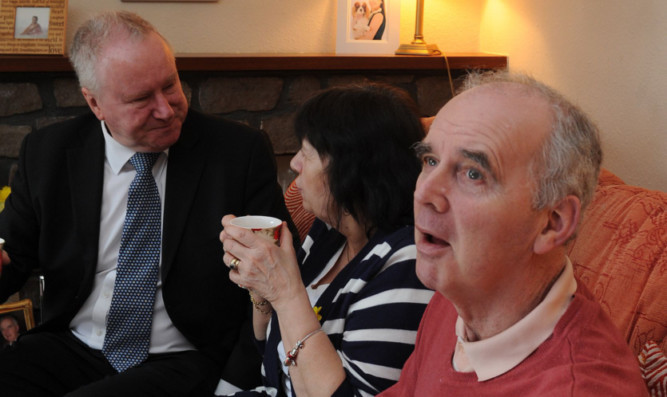 Health Secretary Alex Neil visiting Amanda and the late Frank Kopel earlier this year to discuss support for sufferers of Alzheimers disease under 65.