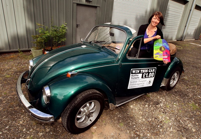 John Stevenson, Courier,02/06/10.Angus,Glamis,Pic shows the first prize raffle car a 1969 VW Beetle Convertible which can be won at the  Scottish Transport Extravaganza at Glamis Castle.Pic shows Lesley Munro from the Strathmore Vintage Vehicle Club with the vehicle.
