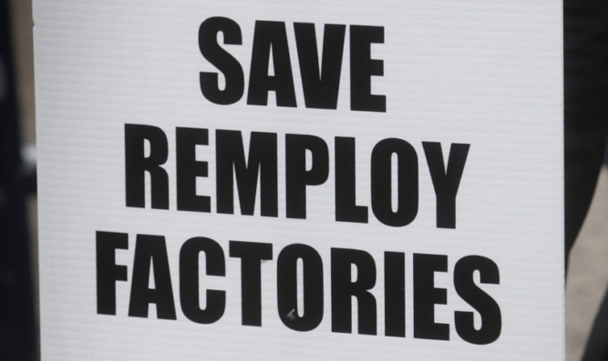 Campaigners on a picket line outside a Remploy factory in Springburn, Glasgow where they began a five-day strike today over the terms off its sell off. PRESS ASSOCIATION Photo. Picture date: Monday September 3, 2012. See PA story SCOTLAND Remploy. Photo credit should read: Danny Lawson/PA Wire