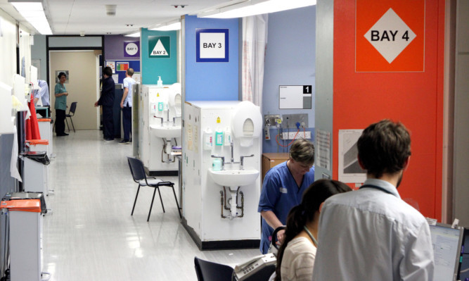 Kris Miller, Courier, 01/02/13. Picture today at the new AMU unit in Ninewells shows some of the staff and bays of the ward.