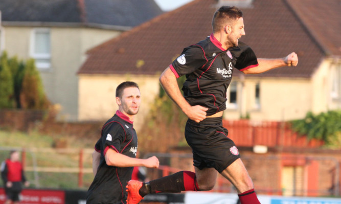 Scott McBride celebrates his equaliser.