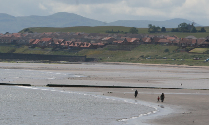 The beach Kirkcaldy, looking little like the "rusted trolley-ridden coastline" described on the site.