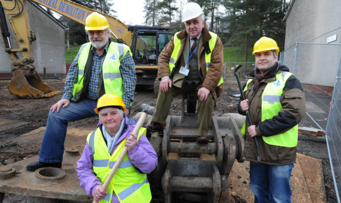 From left  Councillors Iain Gaul, Jeanette Gaul, Ronnie Proctor and Donald Morrison view the demolition work at the site.