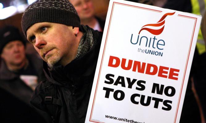 Protesters gathered in the City Square ahead of the council meeting.