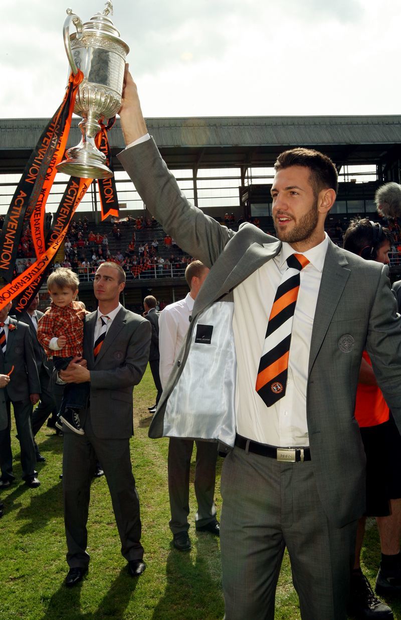 Dundee United win The Active Nation Scottish Cup Final.     United celebrations at Tannadice Park.   Mihael Kovacevic on the park with the cup.