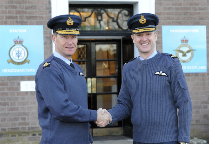 Air Commodore Gavin Parker (left) hands over to the RAF Leuchars new Station Commander and Air Officer Scotland Air Commodore Gerry Mayhew.