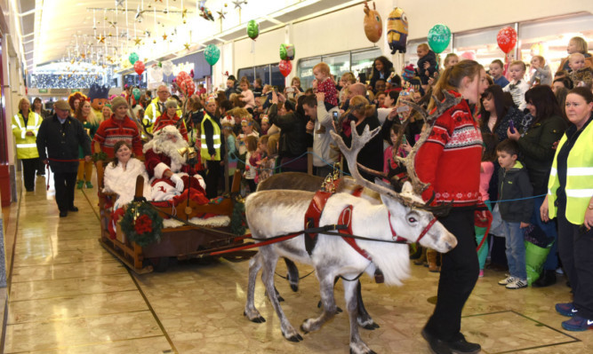 Santa arriving at the Mercat Shopping Centre in Kirkcaldy.