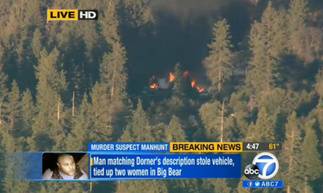 The cabin where Christopher Dorner was believed to be barricaded in is engulfed in flames.