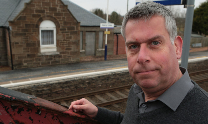 Cllr Brian Boyd is concerned about the poor state of the footbridge at Barry Station.