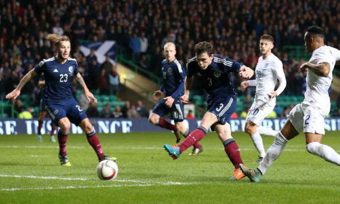 Stevie May watches Andrew Robertson fire in Scotland's goal, after being set up by Johnny Russell.