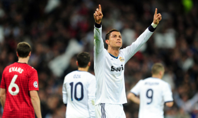 Cristiano Ronaldo celebrates his goal against his former club.