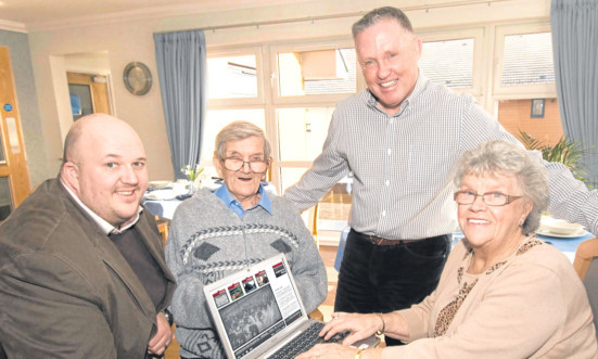 Testing the device at St Ronans Care Home in Dundee are, from left: Scott Downie, of the Memory Box Network, resident George Cumming, Tony Banks of Balhousie and Tonys mother Ruby.