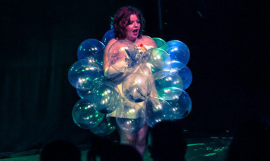 Scarlett Eden performs burlesque on stage