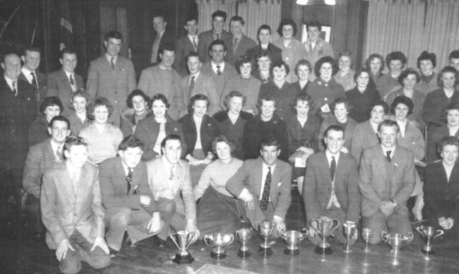 West Fife YFC members and trophy winners in 1957.