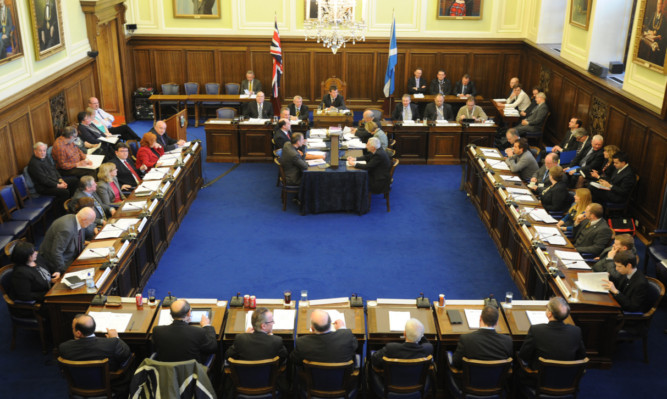 Dundee City Council sits down to agree the budget in the City Chambers.