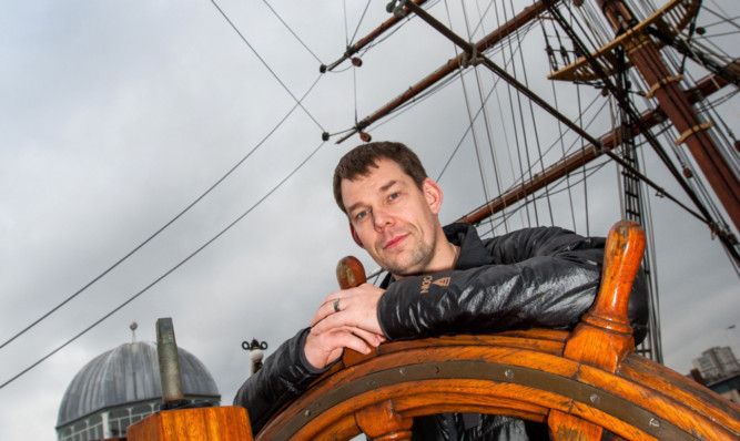 Duncan Slater, a member of the Walking With the Wounded UK team, on board RRS Discovery.