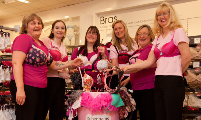 Calling for support  Kay Moran, Gillian Foley, Amanda Scott, Susanne Collin, Karen Ross and Jane Tully help out at the collection box in Debenhams.