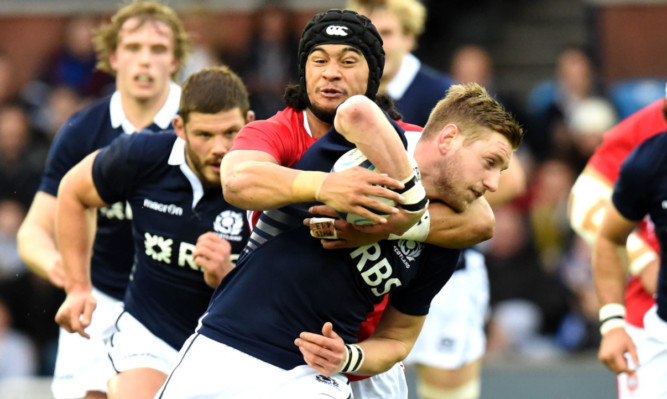 Fly-half Finn Russell had a hand in four of Scotland's five tries against Tonga.