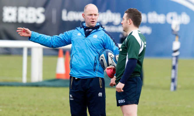 Scotland coach Duncan Hodge (left) chats to Greig Laidlaw.