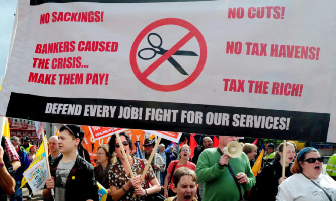 Anti-cuts protesters make their point to the coalition.