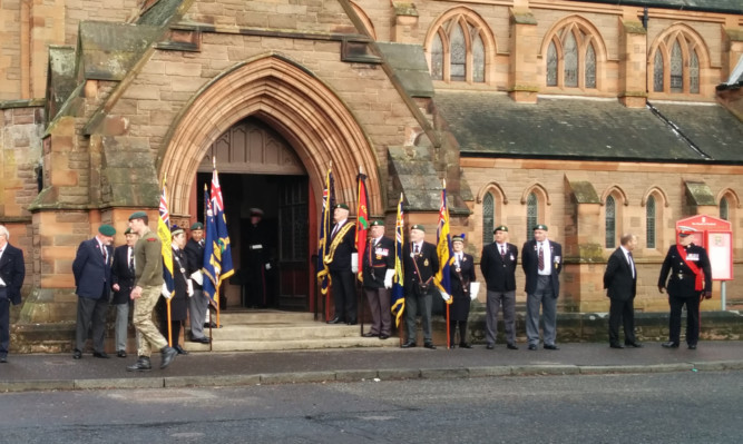 Veterans forming a guard of honour outside the church ahead of the funeral.