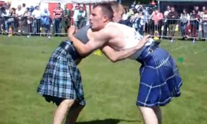 Backhold wrestling at the Balloch Highland Games in 2008.