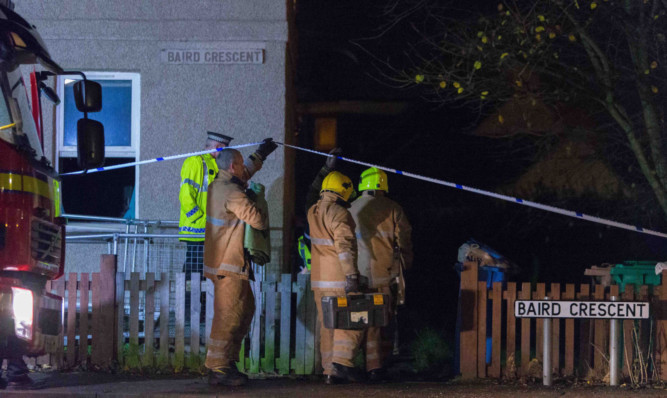 Firefighters at the scene of the fatal Leven blaze on Tuesday evening. Picture: Steven Brown.