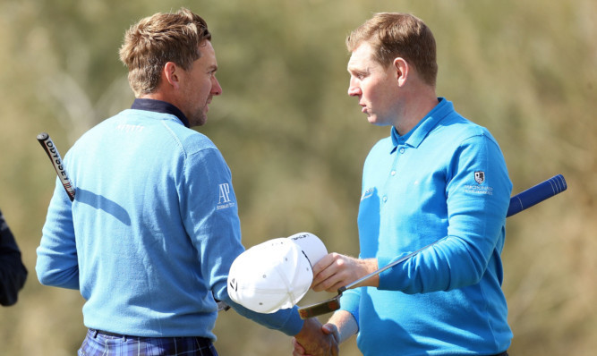 Stephen Gallacher (right) congratulates Ian Poulter on his win.