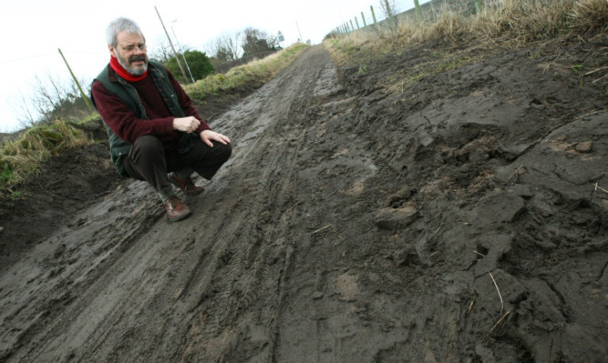Cyclist Hugh Wylie beside the damaged cycle path at Easthaven.