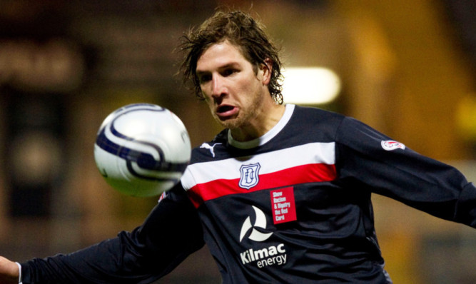 Davide Grassi in action for Dundee.