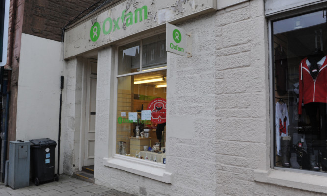 Kim Cessford - 21.02.13 - pictured is the Oxfam shop, East High Street, Forfar which is to close on Saturday