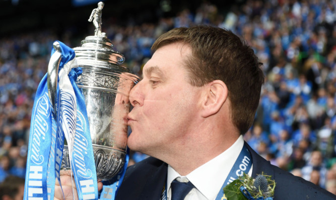 17/05/14 WILLIAM HILL SCOTTISH CUP FINAL
DUNDEE UTD v ST JOHNSTONE
CELTIC PARK - GLASGOW
St Johnstone manager Tommy Wright celebrates with the William Hill Scottish Cup trophy