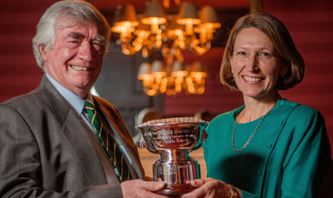 George MacKay receives his British Potato Industry Award from Fiona Fell.